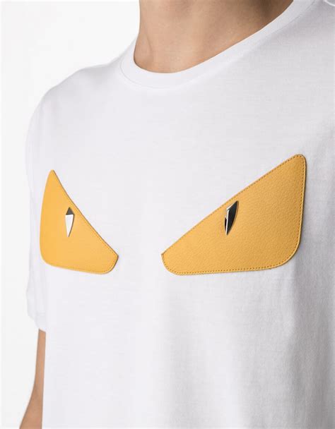 black fendi t shirt yellow eyes|fendi peekaboo t shirt.